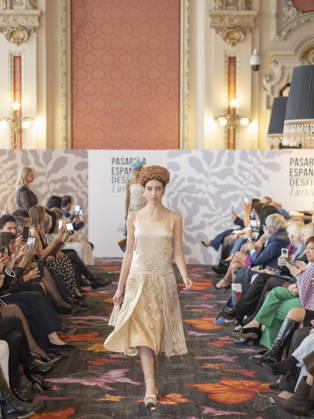April 12, 2026, Madrid, Madrid, Spain: MADRID, SPAIN - APRIL 12: A model showcases a creation by TRADICIONES ISABELA during the Pasarela EspaoÂ±ola LimeLife at Casino Gran Via on April 12, 2026 in Madrid, Spain. Madrid Spain  - ZUMAh199 20260412_zip_h199_016 Copyright: xAaronxHerediax
