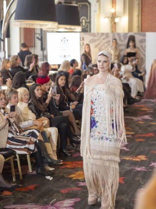 April 12, 2026, Madrid, Madrid, Spain: MADRID, SPAIN - APRIL 12: A model showcases a creation by TRADICIONES ISABELA during the Pasarela EspaoÂ±ola LimeLife at Casino Gran Via on April 12, 2026 in Madrid, Spain. Madrid Spain - ZUMAh199 20260412_zip_h199_019 Copyright: xAaronxHerediax