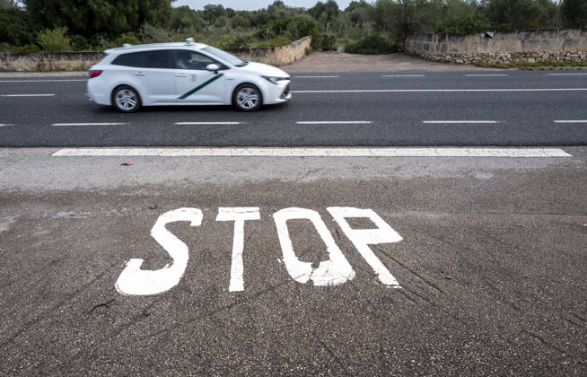 Wines Stop Marking at grey Asphalt, Majorca, Spain 1020930764