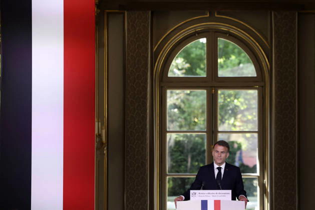 Decoration Ceremony For The Police Forces Who Intervened At The Bataclan - Paris France s President, Emmanuel Macron delivers a speech during a ceremony for awarding collective decorations to the police forces who intervened at the Bataclan during the attacks on November 13, 2015, at the Elysee Presidential palace, in Paris, on April, 21, 2026. Photo by Stephane Lemouton Pool ABACAPRESS.COM Paris France  Copyright: xLemoutonxStephane Pool ABACAx