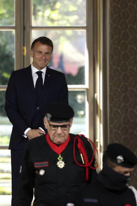 Decoration Ceremony For The Police Forces Who Intervened At The Bataclan - Paris France s President, Emmanuel Macron decorates police officers after awarding them during a ceremony to honour the police officers who intervened in the Bataclan concert hall on November 13, 2015 s attacks, at the Elysee Palace in Paris, on April 21, 2026. ? Stephane Lemouton SIPA LEMOUTONSTEPHANE_260421A044 Credit:Stephane Lemouton SIPA 2604211425 Photo by Stephane Lemouton Pool ABACAPRESS.COM Paris France  Copyright: xLemoutonxStephane Pool ABACAx