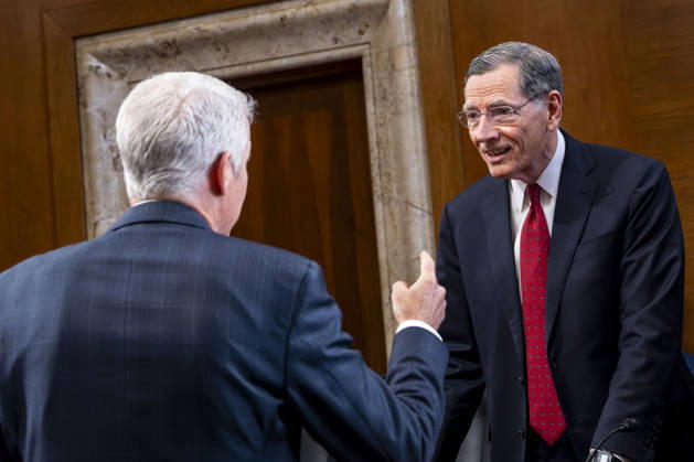 Sen. John Barrasso, R-WY, speaks with Secretary of Energy Chris Wright before a Senate Energy and Natural Resources Committee hearing on the Department of Energy s budget request for fiscal year 2027 in the Dirksen Senate Office Building near the U.S. Capitol in Washington, DC on Tuesday, April 21, 2026. Wright has warned that gas prices may not drop below $3 until next year, which the Trump Administration claims is totally wrong.  WAP20260421300 BONNIExCASH