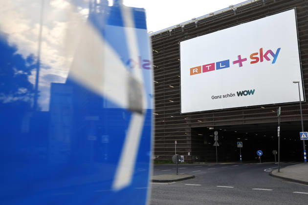 A poster near the headquarters of the TV station RTL on Picassoplatz in Cologne Deutz announces the merger of RTL and Sky RTL is in a crisis of quota pressure and strong streaming competition With the purchase of Sky Deutschland on June 1, 2026 for at least 150 million euros, the Cologne-based broadcaster is planning a liberating blow Theme image, symbolic image C Copyright: xChristophxHardtx