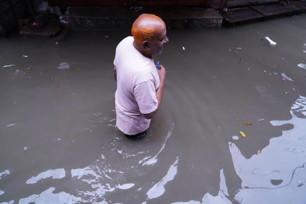 May 1, 2026, Dhaka, Dhaka, Bangladesh: DHAKA, BANGLADESH †May 1, 2026: After several hours of continuous rainfall, many small and major roads across the capital Dhaka were submerged, with water levels ranging from knee-deep to waist-deep in some areas. People forced to leave their homes for work faced severe difficulties, disrupting normal city life. Stray dogs and other animals were also left vulnerable in the flooded conditions. In many cases, clogged manholes filled with plastic waste and debris obstructed drainage systems, leading to widespread waterlogging. Dhaka Bangladesh - ZUMAk185 20260501_zip_k185_014 Copyright: xRubelxKarmakerx