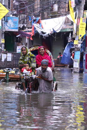 May 1, 2026, Dhaka, Dhaka, Bangladesh: DHAKA, BANGLADESH †May 1, 2026: After several hours of continuous rainfall, many small and major roads across the capital Dhaka were submerged, with water levels ranging from knee-deep to waist-deep in some areas. People forced to leave their homes for work faced severe difficulties, disrupting normal city life. Stray dogs and other animals were also left vulnerable in the flooded conditions. In many cases, clogged manholes filled with plastic waste and debris obstructed drainage systems, leading to widespread waterlogging. Dhaka Bangladesh - ZUMAk185 20260501_zip_k185_010 Copyright: xRubelxKarmakerx