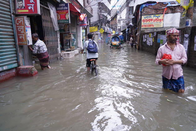 May 1, 2026, Dhaka, Dhaka, Bangladesh: DHAKA, BANGLADESH †May 1, 2026: After several hours of continuous rainfall, many small and major roads across the capital Dhaka were submerged, with water levels ranging from knee-deep to waist-deep in some areas. People forced to leave their homes for work faced severe difficulties, disrupting normal city life. Stray dogs and other animals were also left vulnerable in the flooded conditions. In many cases, clogged manholes filled with plastic waste and debris obstructed drainage systems, leading to widespread waterlogging. Dhaka Bangladesh - ZUMAk185 20260501_zip_k185_001 Copyright: xRubelxKarmakerx