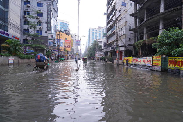 May 1, 2026, Dhaka, Dhaka, Bangladesh: DHAKA, BANGLADESH †May 1, 2026: After several hours of continuous rainfall, many small and major roads across the capital Dhaka were submerged, with water levels ranging from knee-deep to waist-deep in some areas. People forced to leave their homes for work faced severe difficulties, disrupting normal city life. Stray dogs and other animals were also left vulnerable in the flooded conditions. In many cases, clogged manholes filled with plastic waste and debris obstructed drainage systems, leading to widespread waterlogging. Dhaka Bangladesh - ZUMAk185 20260501_zip_k185_035 Copyright: xRubelxKarmakerx