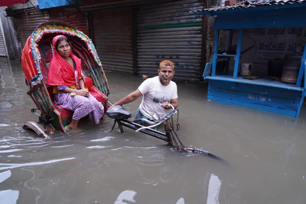 May 1, 2026, Dhaka, Dhaka, Bangladesh: DHAKA, BANGLADESH †May 1, 2026: After several hours of continuous rainfall, many small and major roads across the capital Dhaka were submerged, with water levels ranging from knee-deep to waist-deep in some areas. People forced to leave their homes for work faced severe difficulties, disrupting normal city life. Stray dogs and other animals were also left vulnerable in the flooded conditions. In many cases, clogged manholes filled with plastic waste and debris obstructed drainage systems, leading to widespread waterlogging. Dhaka Bangladesh - ZUMAk185 20260501_zip_k185_032 Copyright: xRubelxKarmakerx