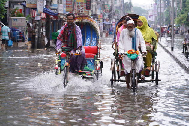 May 1, 2026, Dhaka, Dhaka, Bangladesh: DHAKA, BANGLADESH †May 1, 2026: After several hours of continuous rainfall, many small and major roads across the capital Dhaka were submerged, with water levels ranging from knee-deep to waist-deep in some areas. People forced to leave their homes for work faced severe difficulties, disrupting normal city life. Stray dogs and other animals were also left vulnerable in the flooded conditions. In many cases, clogged manholes filled with plastic waste and debris obstructed drainage systems, leading to widespread waterlogging. Dhaka Bangladesh - ZUMAk185 20260501_zip_k185_049 Copyright: xRubelxKarmakerx