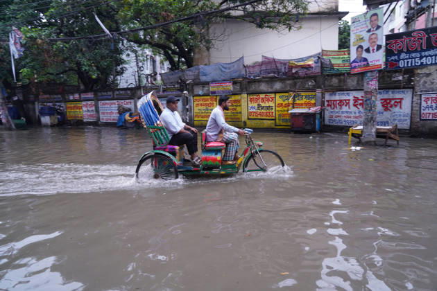 May 1, 2026, Dhaka, Dhaka, Bangladesh: DHAKA, BANGLADESH †May 1, 2026: After several hours of continuous rainfall, many small and major roads across the capital Dhaka were submerged, with water levels ranging from knee-deep to waist-deep in some areas. People forced to leave their homes for work faced severe difficulties, disrupting normal city life. Stray dogs and other animals were also left vulnerable in the flooded conditions. In many cases, clogged manholes filled with plastic waste and debris obstructed drainage systems, leading to widespread waterlogging. Dhaka Bangladesh - ZUMAk185 20260501_zip_k185_022 Copyright: xRubelxKarmakerx