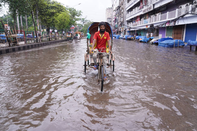 May 1, 2026, Dhaka, Dhaka, Bangladesh: DHAKA, BANGLADESH †May 1, 2026: After several hours of continuous rainfall, many small and major roads across the capital Dhaka were submerged, with water levels ranging from knee-deep to waist-deep in some areas. People forced to leave their homes for work faced severe difficulties, disrupting normal city life. Stray dogs and other animals were also left vulnerable in the flooded conditions. In many cases, clogged manholes filled with plastic waste and debris obstructed drainage systems, leading to widespread waterlogging. Dhaka Bangladesh - ZUMAk185 20260501_zip_k185_043 Copyright: xRubelxKarmakerx