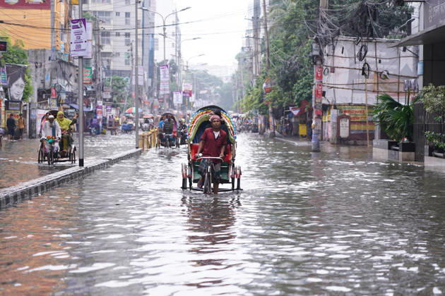 May 1, 2026, Dhaka, Dhaka, Bangladesh: DHAKA, BANGLADESH †May 1, 2026: After several hours of continuous rainfall, many small and major roads across the capital Dhaka were submerged, with water levels ranging from knee-deep to waist-deep in some areas. People forced to leave their homes for work faced severe difficulties, disrupting normal city life. Stray dogs and other animals were also left vulnerable in the flooded conditions. In many cases, clogged manholes filled with plastic waste and debris obstructed drainage systems, leading to widespread waterlogging. Dhaka Bangladesh - ZUMAk185 20260501_zip_k185_041 Copyright: xRubelxKarmakerx
