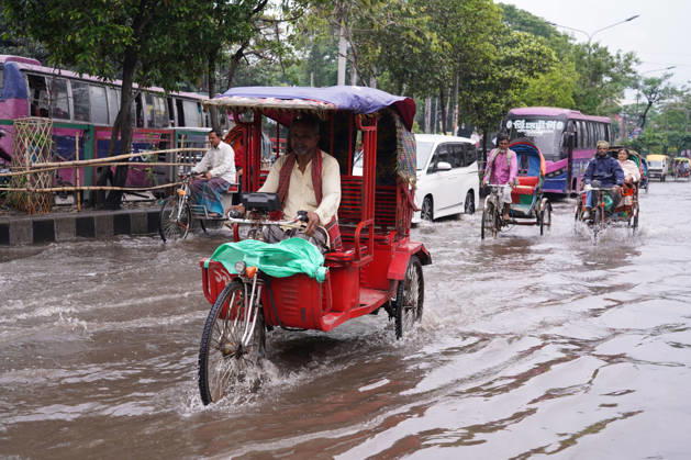 May 1, 2026, Dhaka, Dhaka, Bangladesh: DHAKA, BANGLADESH †May 1, 2026: After several hours of continuous rainfall, many small and major roads across the capital Dhaka were submerged, with water levels ranging from knee-deep to waist-deep in some areas. People forced to leave their homes for work faced severe difficulties, disrupting normal city life. Stray dogs and other animals were also left vulnerable in the flooded conditions. In many cases, clogged manholes filled with plastic waste and debris obstructed drainage systems, leading to widespread waterlogging. Dhaka Bangladesh - ZUMAk185 20260501_zip_k185_037 Copyright: xRubelxKarmakerx