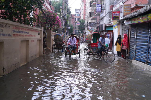 May 1, 2026, Dhaka, Dhaka, Bangladesh: DHAKA, BANGLADESH †May 1, 2026: After several hours of continuous rainfall, many small and major roads across the capital Dhaka were submerged, with water levels ranging from knee-deep to waist-deep in some areas. People forced to leave their homes for work faced severe difficulties, disrupting normal city life. Stray dogs and other animals were also left vulnerable in the flooded conditions. In many cases, clogged manholes filled with plastic waste and debris obstructed drainage systems, leading to widespread waterlogging. Dhaka Bangladesh - ZUMAk185 20260501_zip_k185_033 Copyright: xRubelxKarmakerx