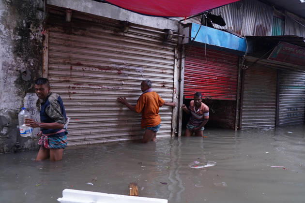 May 1, 2026, Dhaka, Dhaka, Bangladesh: DHAKA, BANGLADESH †May 1, 2026: After several hours of continuous rainfall, many small and major roads across the capital Dhaka were submerged, with water levels ranging from knee-deep to waist-deep in some areas. People forced to leave their homes for work faced severe difficulties, disrupting normal city life. Stray dogs and other animals were also left vulnerable in the flooded conditions. In many cases, clogged manholes filled with plastic waste and debris obstructed drainage systems, leading to widespread waterlogging. Dhaka Bangladesh - ZUMAk185 20260501_zip_k185_026 Copyright: xRubelxKarmakerx