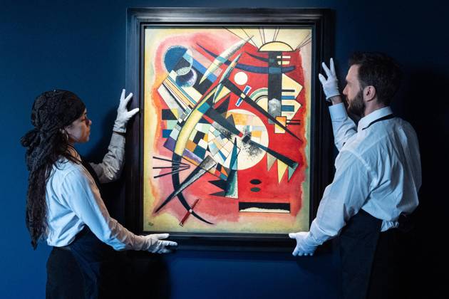 May 1, 2026, Bronx, New York, USA: Auction assistants pose with Wassily Kandinsky Rote Tiefe (Red Depth) during May Marquee Modern & Contemporary Auctions press preview at Sotheby s The Breuer in New York, NY on May 1, 2026. Bronx USA - ZUMAr339 20260501_znp_r339_040 Copyright: xLevxRadinx