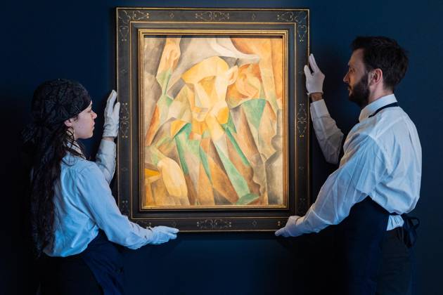 May 1, 2026, Bronx, New York, USA: Auction assistants pose with Pablo Picasso Arlequin during May Marquee Modern & Contemporary Auctions press preview at Sotheby s The Breuer in New York, NY on May 1, 2026. Bronx USA - ZUMAr339 20260501_znp_r339_038 Copyright: xLevxRadinx
