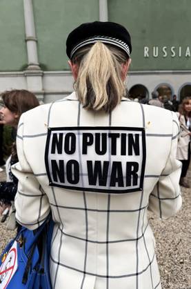 The 61st International Art Exhibition Biennale Arte 2026 will take place in Venice from May 9 to November 22, 2026 The event will be held in Arsenale and Giardini Photo In front of the Russia Pavilion Woman with jacket No Putin, No War