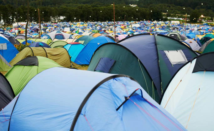 Tent, field and outdoor for festival or camping in nature, summer or forest for adventure or vacation. Event, campsite or setup for sleeping, rest or shelter in woods, trees or environment background. (License=RF) ,model released, Symbolfoto Copyright: xZoonar.com YurixArcursx 21178686 ,model released, Symbolfoto ,property released