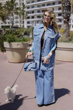 Cannes Heidi Klum Exits Martinez MP Cannes, France- May 12: Heidi Klum arrives to Hotel Martinez beach restaurant during 79th Festival of Cannes, on May 12, 2026 in Cannes, France. Photo by Marco Piovanotto ABACAPRESS:COM Cannes France Copyright: xPiovanottoxMarco ABACAx