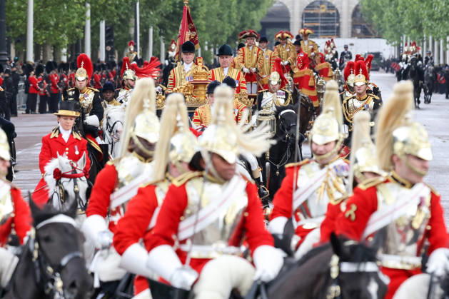 May 13, 2026, London, London, UK: London, UK. KING CHARLES III and QUEEN CAMILLA travel along the Mall as they arrive back at Buckingham Palace after the State Opening of Parliament and The Kings Speech at the House of Lords, in Westminster, London. The Kings Speech marks the formal start of the parliamentary year and sets out the government s agenda for the 2026-27 session. London UK - ZUMAl94_ 20260513_zaf_l94_043 Copyright: xDinendraxHariax