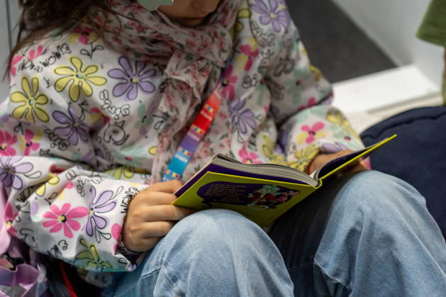 May 15, 2026, Turin, To, Italy: Some moments from the second day of the International Book Fair. Pictured is a little girl reading a book. Turin, May 15, 2026 Turin Italy - ZUMAa289 20260515_zia_a289_016 Copyright: xSelenexDanielex xAgfx