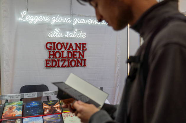 May 15, 2026, Turin, To, Italy: Some moments from the second day of the International Book Fair. Pictured is a boy reading a book. Turin, May 15, 2026 Turin Italy - ZUMAa289 20260515_zia_a289_009 Copyright: xSelenexDanielex xAgfx
