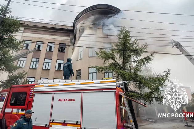 RUSSIA, IRKUTSK - MAY 23, 2026: Firefighters battle a fire at Research Institute of Precious and Rare Metals and Diamonds. Video grab. Best quality available. Russia Emergencies Ministry TASS  92905867