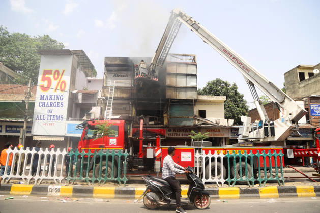 Firefighting operations underway after fire breaks out at a commercial building in Kingsway Camp near GTB Nagar metro station New Delhi, May 23 (ANI): Firefighting operations underway after fire breaks out at a commercial building in Kingsway Camp near GTB Nagar metro station, in New Delhi on Saturday. New Delhi Delhi India Copyright: xANIx ANI_20260523110