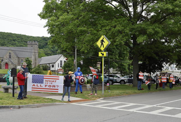 A few protesters gather outside the gates of the West Point Military Academy before the West Point Class of 2026 s commencement ceremony in Michie Stadium at the United States Military Academy in West Point, New York on Saturday, May 23, 2026. .  NYP202605239022 PeterxFoley