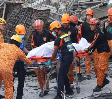 Building collapsed in Philippines, trapping multiple people, killing at least one ANGELES, PAMPANGA PROVINCE, PHILIPPINES - MAY 24: (----EDITORIAL USE ONLY - MANDATORY CREDIT - BUREAU OF FIRE PROTECTION (BFP) HANDOUT - NO MARKETING NO ADVERTISING CAMPAIGNS - DISTRIBUTED AS A SERVICE TO CLIENTS----) (EDITORS NOTE: Image depicts death) A body of a Malaysian national was recovered from the rubble of a building after it collapsed, in Angeles, Pampanga Province, Philippines, on May 24, 2026. One Malaysian national has been found dead, at least 24 were rescued alive and at least 21 are still missing, after the nine-storey building that was under construction collapsed, according to the local authorities. Search and rescue efforts are still un Copyright: x2026xAnadoluxBureauxofxFirexProtectionx xHandoutx