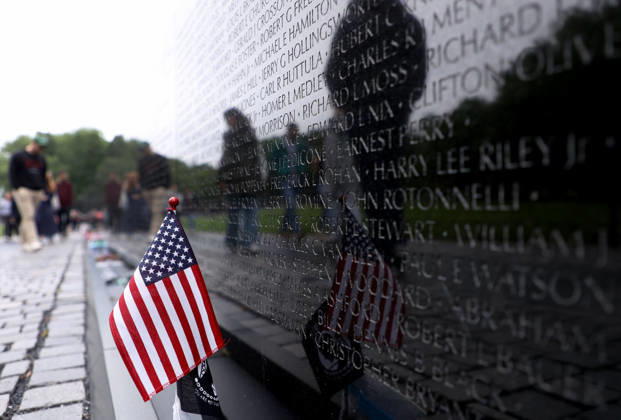 May 24, 2026, Washington, District Of Columbia, USA: Visitors are reflected at the Vietnam Veterans Memorial following the Rolling to Remember ride over Memorial Day weekend in Washington, DC, USA, on May 24, 2026. The Rolling to Remember tradition has been active for 38 years, honouring fallen service members, prisoners of war, and those still missing in action during Memorial Day weekend. Washington USA  - ZUMAs337 20260524_znp_s337_044 Copyright: xGentxShkullakux