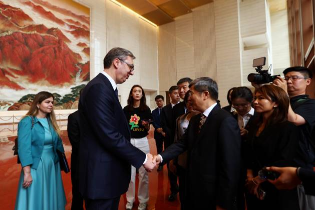 BEIJING, CHINA - MAY 26: Serbian President Aleksandar Vucic (L) shakes hands with Li Zongyuan, curator of the Museum of the Communist Party of China, during a visit to the the Museum of the Communist Party of China (CPC) on May 26, 2026 in Beijing, China. Vucic is on a state visit to China. Copyright: xChinaxNewsxServicex 111644204631