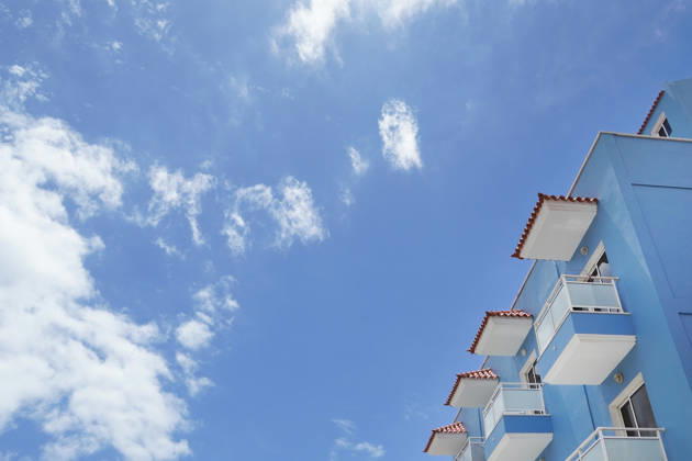 Subject Sun, Beach and Sea, Modern Hotel and Fair weather clouds from the Subview as Symbol image for Summer holiday on Sea, Beach vacation, All Included Vacation, Z B Canary Islands, Mediterranean islands 1131609794