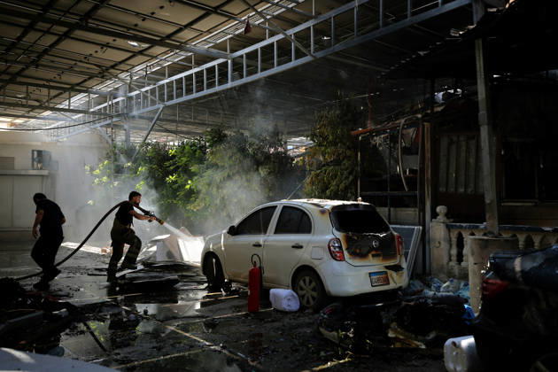June 2, 2026, Tyre, Tyre, Lebanon: A fire fighter douses fire at a parking lot of Jabal Amel Hospital that was destroyed in Israeli air strikes in the southern Lebanese port city of Tyre. Clashes have continued in southern Lebanon despite Israel and Hezbollah accepting a US plan for a partial ceasefire. President Donald Trump said he had spoken to both sides and they agreed that all shooting will stop , after Iran warned Israeli military actions in Lebanon were a threat to the US-Iran ceasefire. Tyre Lebanon - ZUMAn313 20260602_zip_n313_014 Copyright: xMarwanxNaamanix