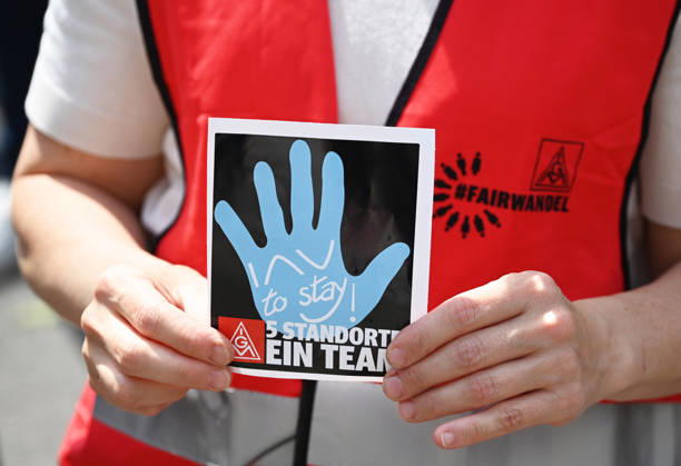 Protest rally by employees of IAV in Berlin BERLIN, GERMANY - JUNE 02: Employees of automotive development services provider IAV take part in a protest rally against job cuts and the closure of parts of the company’s facilities in Berlin, on June 02,2026. Employees at IAV are protesting planned job cuts in Germany expected by mid-2027, including the effective closure of the company’s Berlin site, which would impact around 1,250 employees, according to local media. Vladimir Sindeyev Anadolu Berlin Germany. Editorial use only. Please get in touch for any other usage.  Copyright: x2026xAnadoluxVladimirxSindeyevx