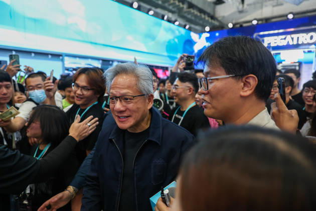 NVIDIA s CEO Jensen Huang visits COMPUTEX TAIPEI 2026 TAIPEI, TAIWAN - JUNE 3: Jensen Huang, the CEO of American multinational tech giant NVIDIA, is surrounded by heaps of supporters and staff during his visit to the COMPUTEX TAIPEI trade show, in Taipei, Taiwan, on June 3, 2026. COMPUTEX TAIPEI is one of the world’s largest and most significant trade shows, featuring latest technologies, drones, data centres, Artificial Intelligence (AI) technologies, supercomputers, semiconductors products and other things from major international firms such as Nvidia, Intel, NXP and Foxconn. Daniel Ceng Anadolu Taipei Taiwan. Editorial use only. Please get in touch for any other usage. Copyright: x2026xAnadoluxDanielxCengx