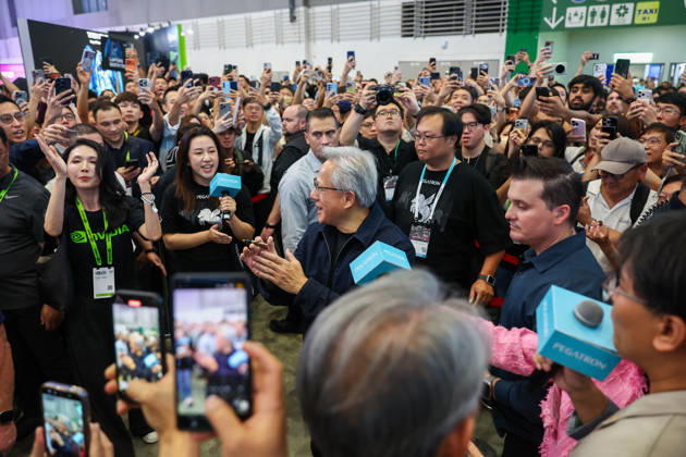 NVIDIA s CEO Jensen Huang visits COMPUTEX TAIPEI 2026 TAIPEI, TAIWAN - JUNE 3: Jensen Huang, the CEO of American multinational tech giant NVIDIA, applaud as he is surrounded by heaps of supporters and staff during his visit to the COMPUTEX TAIPEI trade show, in Taipei, Taiwan, on June 3, 2026. COMPUTEX TAIPEI is one of the world’s largest and most significant trade shows, featuring latest technologies, drones, data centres, Artificial Intelligence (AI) technologies, supercomputers, semiconductors products and other things from major international firms such as Nvidia, Intel, NXP and Foxconn. Daniel Ceng Anadolu Taipei Taiwan. Editorial use only. Please get in touch for any other usage. Copyright: x2026xAnadoluxDanielxCengx
