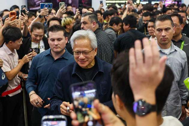NVIDIA s CEO Jensen Huang visits COMPUTEX TAIPEI 2026 TAIPEI, TAIWAN - JUNE 3: Jensen Huang, the CEO of American multinational tech giant NVIDIA, is surrounded by heaps of supporters and staff during his visit to the COMPUTEX TAIPEI trade show, in Taipei, Taiwan, on June 3, 2026. COMPUTEX TAIPEI is one of the world’s largest and most significant trade shows, featuring latest technologies, drones, data centres, Artificial Intelligence (AI) technologies, supercomputers, semiconductors products and other things from major international firms such as Nvidia, Intel, NXP and Foxconn. Daniel Ceng Anadolu Taipei Taiwan. Editorial use only. Please get in touch for any other usage. Copyright: x2026xAnadoluxDanielxCengx