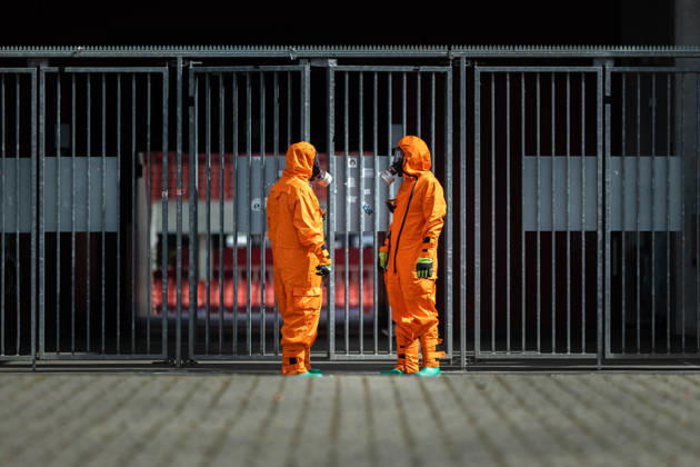 resConEx 2026 on 03 06 2026 at the RheinEnergieStadion in Cologne People in protective suits in front of the stadium xJRx