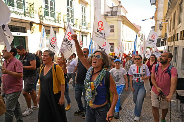 Nationwide Strike For Workers Lisbon LISBON, PORTUGAL - JUNE 03: Protesters hold a banner and wave red trade union flags as they line the streets during a national mobilization in Lisbon, Portugal on June 03, 2026. The demonstration, organized under the National Fight Day motto, demands increased wages, guaranteed labor rights, and measures against the rising cost of living, while advocating for the right to health and housing. Zed Jameson Anadolu Lisbon Portugal. Editorial use only. Please get in touch for any other usage.  Copyright: x2026xAnadoluxZedxJamesonx