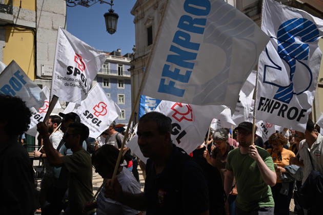 Nationwide Strike For Workers Lisbon LISBON, PORTUGAL - JUNE 03: Protesters hold a banner and wave red trade union flags as they line the streets during a national mobilization in Lisbon, Portugal on June 03, 2026. The demonstration, organized under the National Fight Day motto, demands increased wages, guaranteed labor rights, and measures against the rising cost of living, while advocating for the right to health and housing. Zed Jameson Anadolu Lisbon Portugal. Editorial use only. Please get in touch for any other usage.  Copyright: x2026xAnadoluxZedxJamesonx