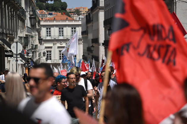 Nationwide Strike For Workers Lisbon LISBON, PORTUGAL - JUNE 03: Protesters hold a banner and wave red trade union flags as they line the streets during a national mobilization in Lisbon, Portugal on June 03, 2026. The demonstration, organized under the National Fight Day motto, demands increased wages, guaranteed labor rights, and measures against the rising cost of living, while advocating for the right to health and housing. Zed Jameson Anadolu Lisbon Portugal. Editorial use only. Please get in touch for any other usage.  Copyright: x2026xAnadoluxZedxJamesonx