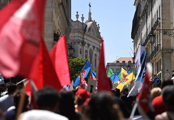 Nationwide Strike For Workers Lisbon LISBON, PORTUGAL - JUNE 03: Protesters hold a banner and wave red trade union flags as they line the streets during a national mobilization in Lisbon, Portugal on June 03, 2026. The demonstration, organized under the National Fight Day motto, demands increased wages, guaranteed labor rights, and measures against the rising cost of living, while advocating for the right to health and housing. Zed Jameson Anadolu Lisbon Portugal. Editorial use only. Please get in touch for any other usage.  Copyright: x2026xAnadoluxZedxJamesonx