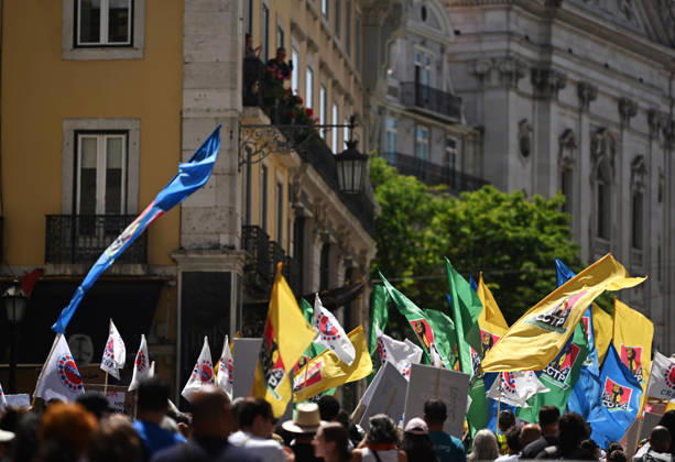 Nationwide Strike For Workers Lisbon LISBON, PORTUGAL - JUNE 03: Protesters hold a banner and wave red trade union flags as they line the streets during a national mobilization in Lisbon, Portugal on June 03, 2026. The demonstration, organized under the National Fight Day motto, demands increased wages, guaranteed labor rights, and measures against the rising cost of living, while advocating for the right to health and housing. Zed Jameson Anadolu Lisbon Portugal. Editorial use only. Please get in touch for any other usage.  Copyright: x2026xAnadoluxZedxJamesonx