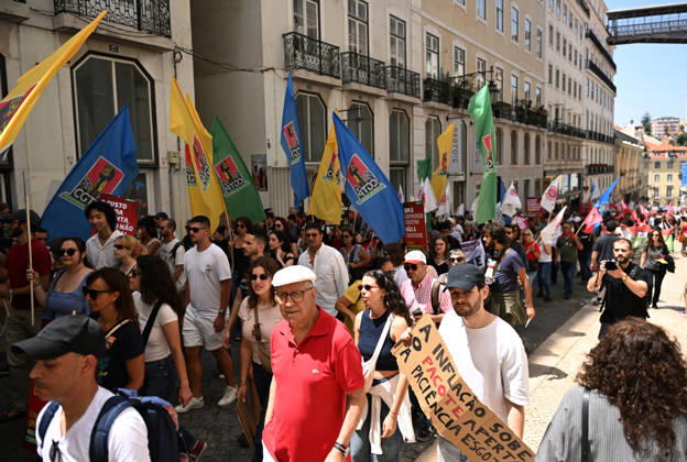 Nationwide Strike For Workers Lisbon LISBON, PORTUGAL - JUNE 03: Protesters hold a banner and wave red trade union flags as they line the streets during a national mobilization in Lisbon, Portugal on June 03, 2026. The demonstration, organized under the National Fight Day motto, demands increased wages, guaranteed labor rights, and measures against the rising cost of living, while advocating for the right to health and housing. Zed Jameson Anadolu Lisbon Portugal. Editorial use only. Please get in touch for any other usage.  Copyright: x2026xAnadoluxZedxJamesonx