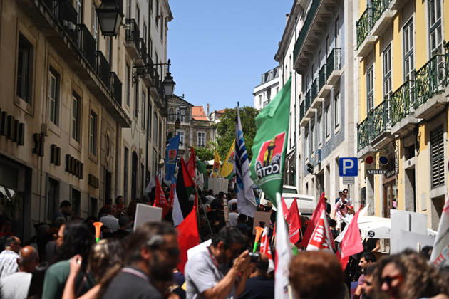Nationwide Strike For Workers Lisbon LISBON, PORTUGAL - JUNE 03: Protesters hold a banner and wave red trade union flags as they line the streets during a national mobilization in Lisbon, Portugal on June 03, 2026. The demonstration, organized under the National Fight Day motto, demands increased wages, guaranteed labor rights, and measures against the rising cost of living, while advocating for the right to health and housing. Zed Jameson Anadolu Lisbon Portugal. Editorial use only. Please get in touch for any other usage.  Copyright: x2026xAnadoluxZedxJamesonx