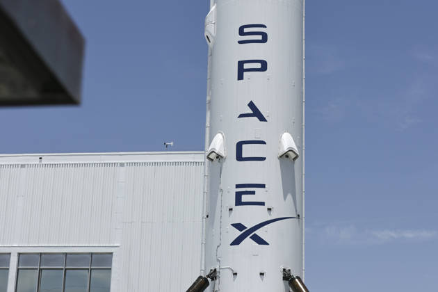 SpaceX Sets I.P.O. Price SpaceX signage outside the Space Exploration Technologies Corp. facility in Hawthorne, California, on June 3, 2026. SpaceX is set to begin trading on the Nasdaq under the ticker symbol SPCX. Hawthorne California United States  Copyright: xMichaelxYanowx originalFilename: yanow-notitle260603_np14t.jpg