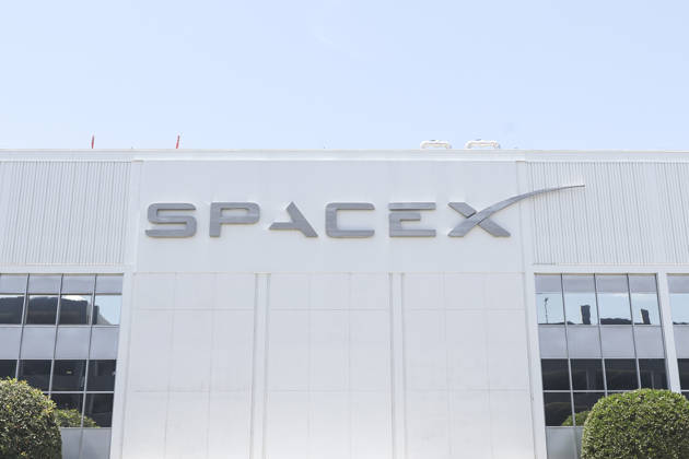 SpaceX Sets I.P.O. Price SpaceX signage outside the Space Exploration Technologies Corp. facility in Hawthorne, California, on June 3, 2026. SpaceX is set to begin trading on the Nasdaq under the ticker symbol SPCX. Hawthorne California United States  Copyright: xMichaelxYanowx originalFilename: yanow-notitle260603_npL6B.jpg