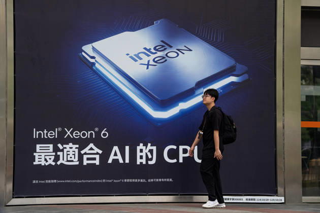 TAIWAN-COMPUTEX A man walks pass a billboard showing an Intel Xeon 6 CPU in Taipei, Taiwan, June 4, 2026. NEXPHER Vernon Yuen TAIPEI